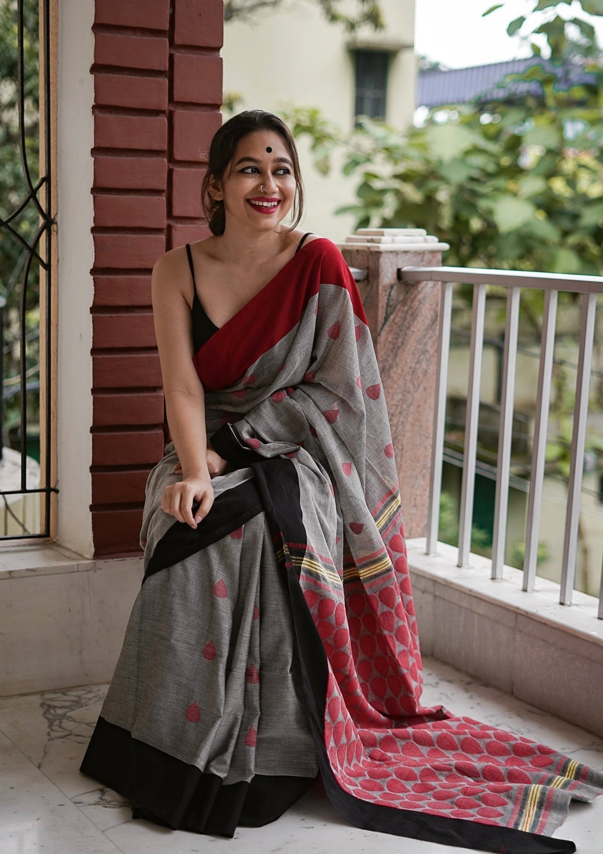 grey and red linen printed saree