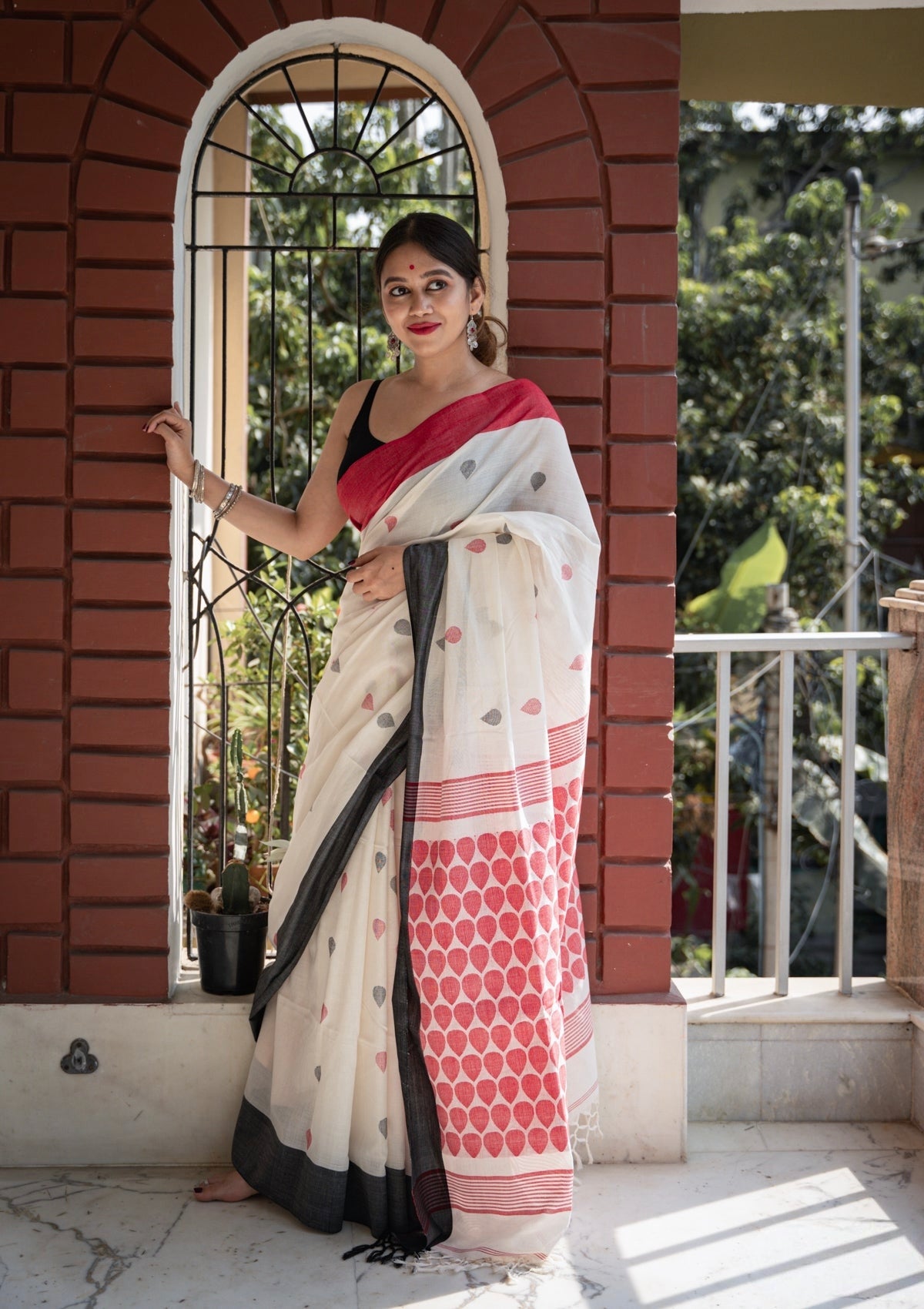 white and red linen printed saree